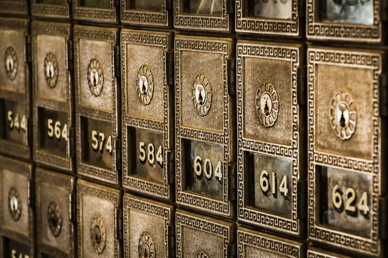 Rows of numbered safe deposit boxes